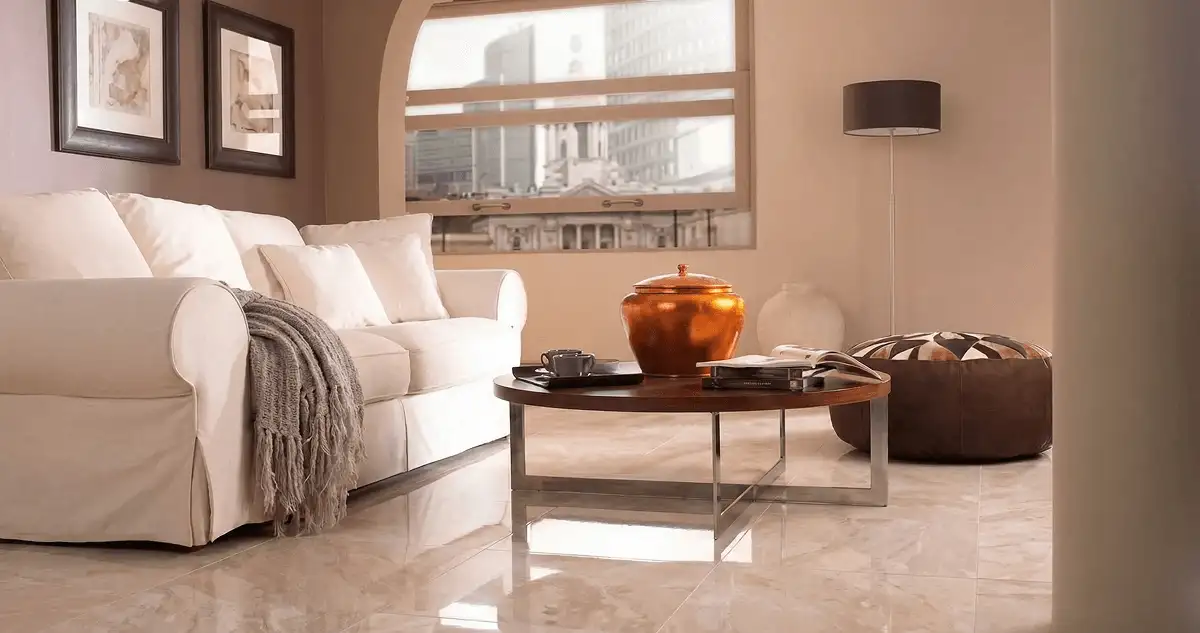 Modern living room with professionally installed marble flooring, a beige sofa, coffee table in Arlington, TX